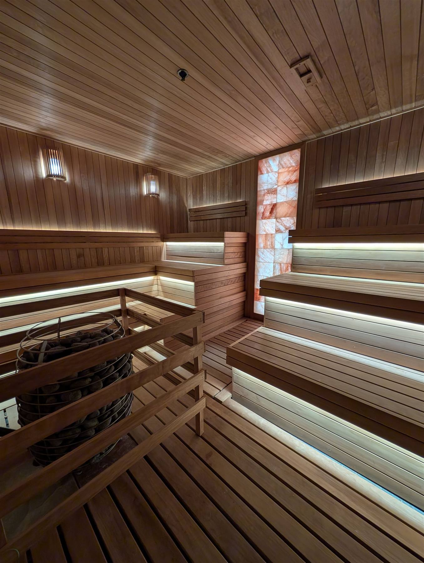Himalayan salt wall sauna with warm accent lighting at VIVE Health & Fitness