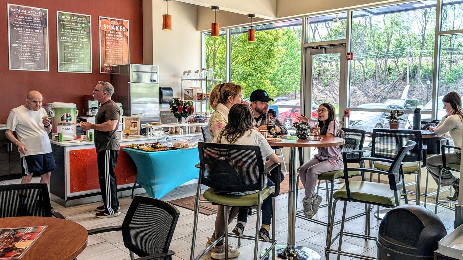 The VIVE Shake Bar with menu boards, blender station and cafe seating
