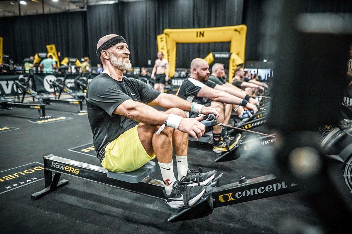 An athlete on a rowing machine